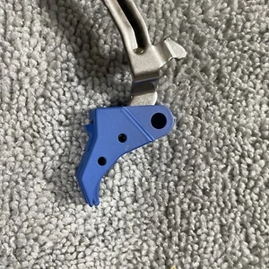 CURVED FACE CARRY TRIGGER W/ BAR FOR GEN 3 GL0CK MODELS 17, 19, 23, 26, 27, BLUE - Picture 1 of 3
