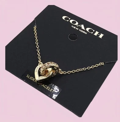 Pulsera deslizante Coach Heart Interlocking nueva con etiquetas Foto 1 de 4