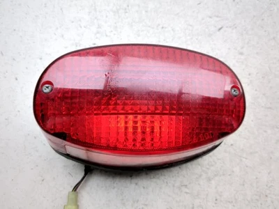 98-08 Yamaha V Star XVS 650 Luz trasera Luz de freno trasera Lámpara Lente Foto 1 de 4