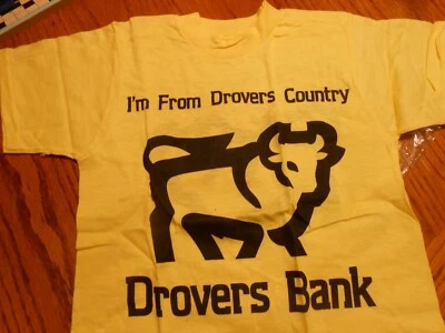 VINTAGE BOYS DROVERS BANK T-SHIRT SIZE 10-12 YELLOW NEW - Imagem 1 de 4