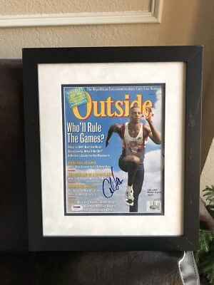 Olympic Gold Medalist Carl Lewis Autographed Outside Magazine Framed. PSA COA - Image 1 of 4