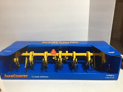 Caterpillar 6 Row Field Cultivator from Farm Country 1/16 Scale by Ertl - Image 1 of 4