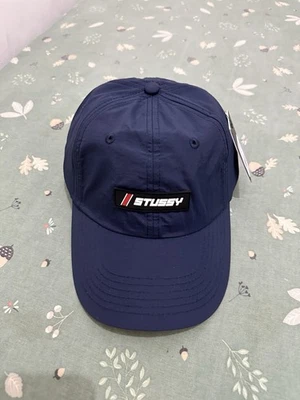 Gorra Stussy Reggie Tech Low Pro - Azul marino Foto 1 de 4