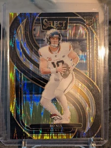 Bo Nix 2024 Panini Select Black & Gold Shock Premier RC Denver Broncos - Bild 1 von 2