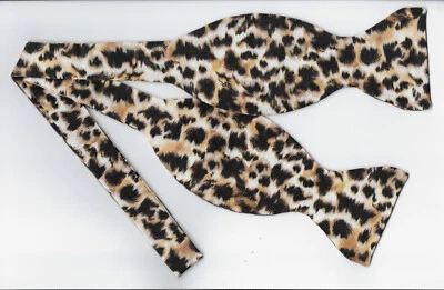 Pajarita con estampado animal, manchas negras en bronceado, gato salvaje, exótico, pajarita autoatada Foto 1 de 4