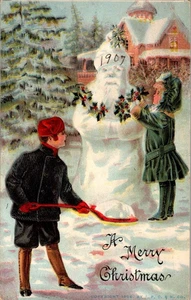 Niños haciendo un muñeco de nieve de Papá Noel 1907 postal en relieve a121 - Imagen 1 de 2