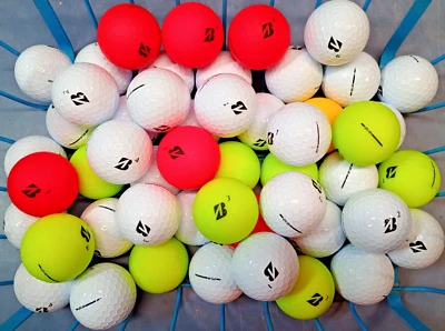 100 pelotas de golf Bridgestone e12 4A/5A usadas multicolores (8 docenas + 4 adicionales) Foto 1 de 4