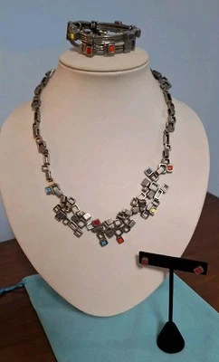 Estaño brutalista Osmose Sonia Ferland Demi Parure Foto 1 de 4