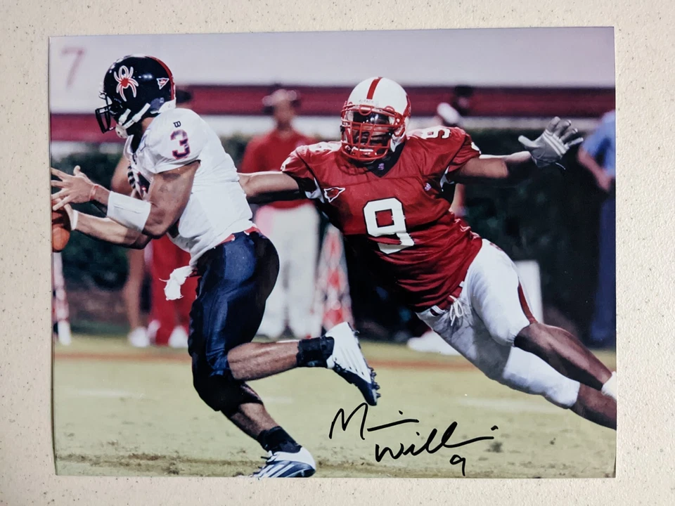 FOTO de fútbol americano 8x10 firmada por Mario Williams NFL NCAA NC certificado de autenticidad automático A Foto 1 de 1