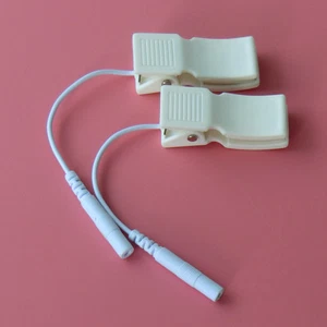10 pares/lote de almohadillas de electrodo con clip para orejas de pecho para masajeador Tens/Ems - Imagen 1 de 9