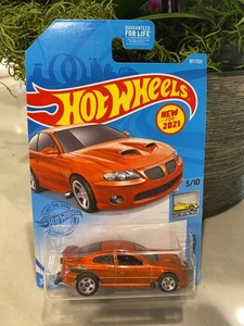 2021 Hot Wheels #87 Factory Fresh 5/10 '06 PONTIAC GTO Burnt Orange mit Chrom 5Sp - Bild 1 von 1