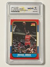 1996-97 FLEER #U-4 MICHAEL JORDAN ULTRA DECADE OF EXCELLENCE WCG GRADED 10