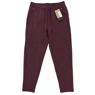 Nike A.P.S. Pantalones versátiles Dri-FIT ADV Stealth para hombre borgoña FN3020-652 Foto 1 de 4