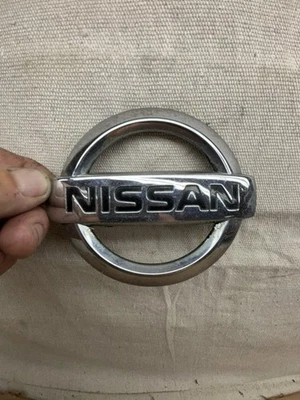 Nissan OEM 2002 2003 2004 Xterra Rear Chrome Emblem Badge Logo Nameplate - Image 1 of 4