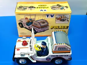 Vintage batteriebetriebener Polizeikapitän Jeep Blechspielzeug mit OVP - Bild 1 von 18