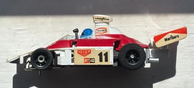 AFX AURORA G-PLUS 1976 McLaren M23 #11 TEXACO-MARLBORO James Hunt HO Slot Car V2 - image 1 of 4