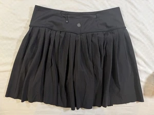 Athleta Elevate Skort nero taglia small plissettato tennis attivo golf gonna pantaloncini - Foto 1 di 10