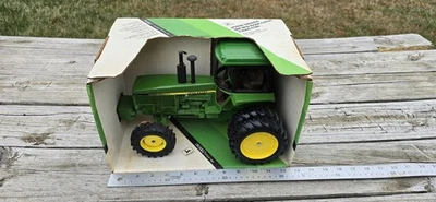 Ertl  1/16 JOHN DEERE MFWD ROW-CROP TRACTOR #584 Duel Rear Wheels IN BOX VTG - Image 1 of 4