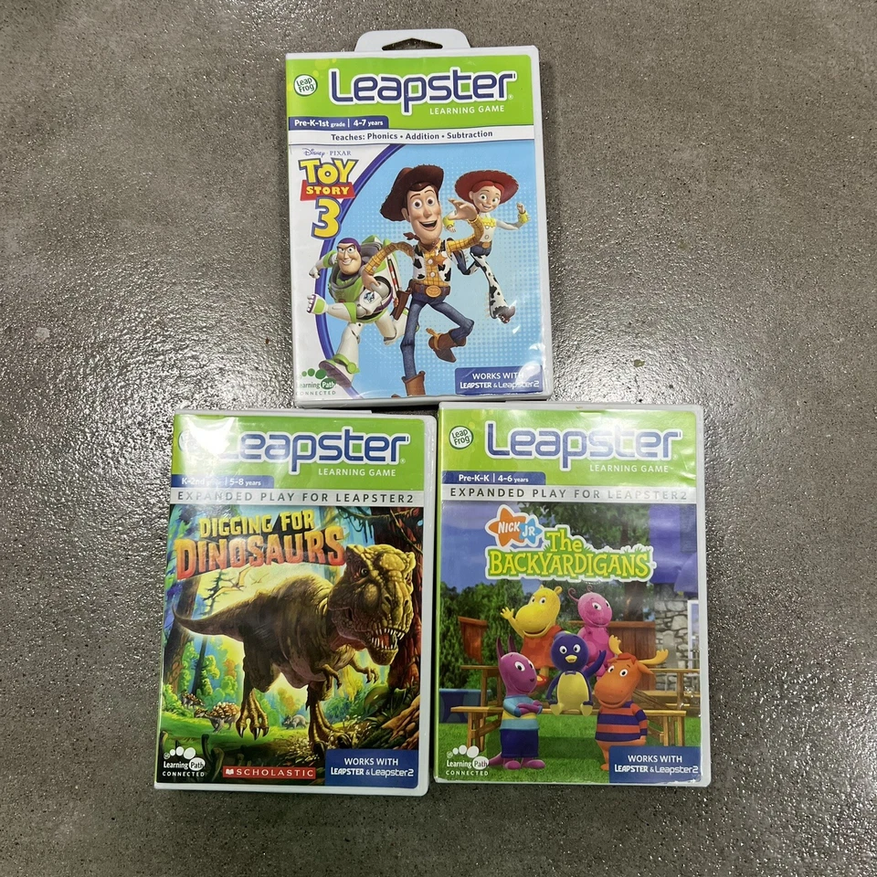 Lot 3 LeapFrog Leapster 1 & 2 The Backyardigans, Digging Dinosaurs , Toy Story 3 - Image 1 of 4