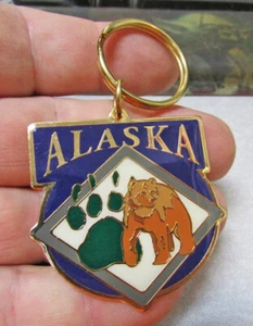 Schlüsselanhänger Schlüsselring Alaska Grizzlybär & Pfotenabdruck Metall, buntes Souvenir - Bild 1 von 3