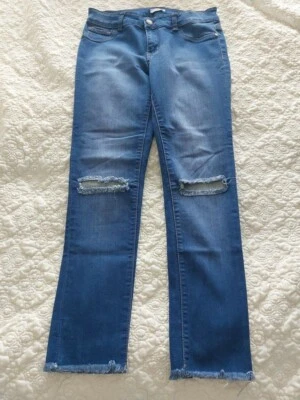 Pantalones de mezclilla para niñas talla grande calce elástico dobladillo deshilachado 26" entrepierna Foto 1 de 2