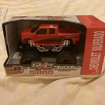 New Bright 2424 R/C Motor Sport Red Chevrolet Silverado 1:24 Trail Boss - Image 1 of 4