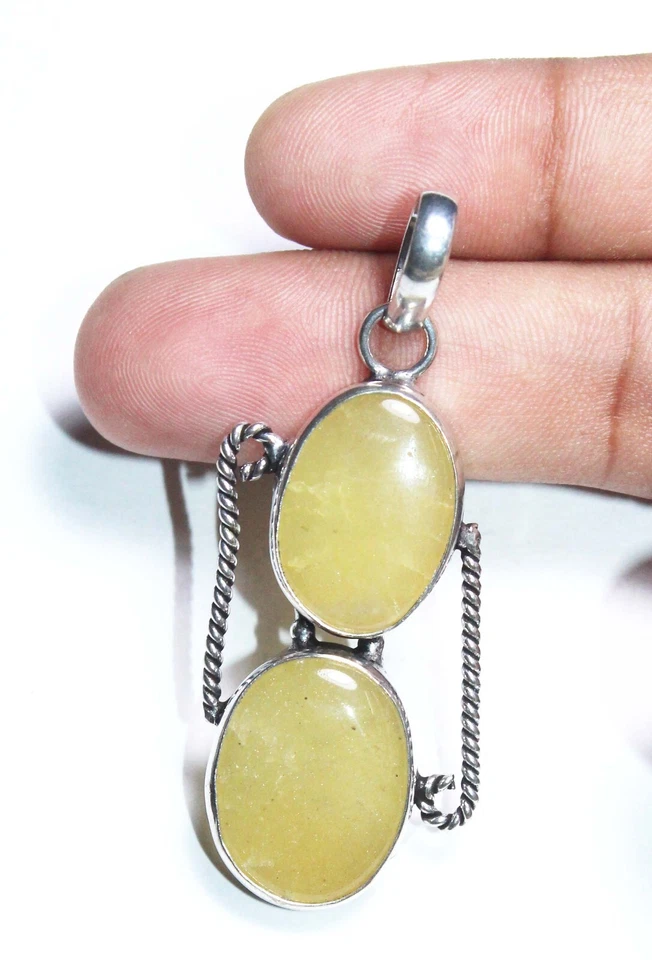 Colgante hecho a mano de piedras preciosas de forma ovalada de calcita tamaño 1,5 pulgadas Foto 1 de 4