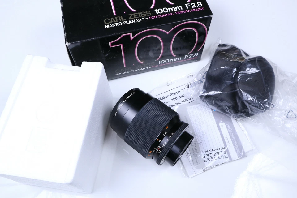 Contax Zeiss Planar 100 mm F/2.8 Lens LN in box with Manual and others  - Image 1 of 4