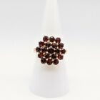 An Attractive 9Ct Yellow Gold Ring With Cluster Of Garnet