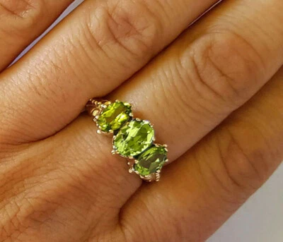 R203 Genuine 9ct Yellow Gold Natural Peridot 3-stone Trilogy Ring in your size - Image 1 of 3