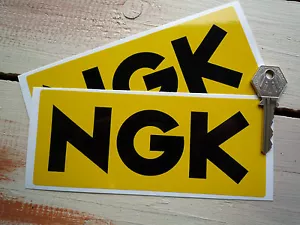NGK Black & Yellow Oblong STICKERS 6.5" Par Nissan Kawasaki Karting Snowmobile - Imagen 1 de 1