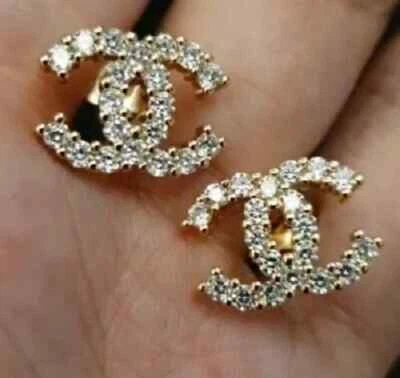 Aretes para mujer de diamantes de corte redondo de 2 quilates enchapados en oro amarillo de 14 quilates Foto 1 de 4
