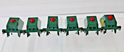American Flyer by Gilbert 730 Bumpers Lot of 6 All Red Bulbs Med Green Body - Image 1 of 4