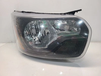Faro derecho Ford Transit 350 2015-24 pasajero - halógeno con moldura negra Foto 1 de 4