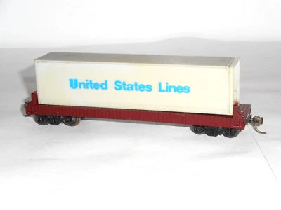 Tyco flatcar & unbranded container . Good overall cond. HO Scale. No box. - Image 1 of 4