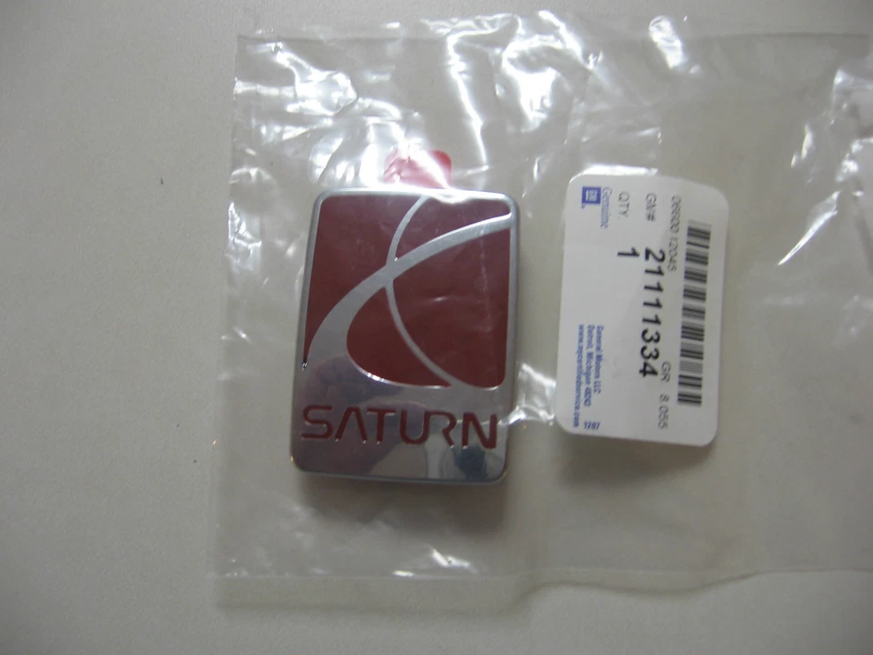 NUEVO EMBLEMA CAPÓ SERIE L SATURN 2000-2002 SERIE LW 21111334 Foto 1 de 2