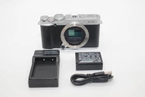 Finest Fujifilm X-A1 body silver with battery charger! - Bild 1 von 7