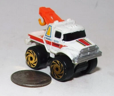 Small Micro Machine Tow truck in White with Red Trim City Towing w/Turbo Wheels - Image 1 of 4