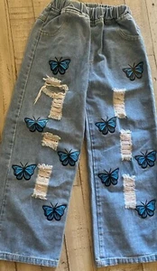 GIRLS WIDE LEGGED BUTTERFLY PRINT RIPPED JEANS SZ 9-10 - Picture 1 of 5