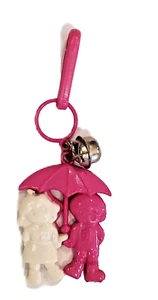 Vintage 1980s  Boy and Girl Under an Umbrella Plastic Clip Bell Charm - Picture 1 of 1
