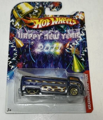 Camión de arrastre Volkswagen azul 2011 feliz año nuevo base metálica Hot Wheels Foto 1 de 4