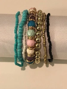 Brand new set of seven stretch beaded bracelets with a Gift Bag - Picture 1 of 2
