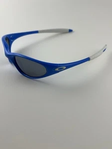 Oakley Minute 1.0 Marco Azul Cielo Negro Lente Iridio Blanco Iconos Oreja Calcetines Gen 2 - Imagen 1 de 7