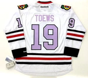 JONATHAN TOEWS CHICAGO BLACKHAWKS LAVENDER CANCER REEBOK PREMIER JERSEY - Picture 1 of 5