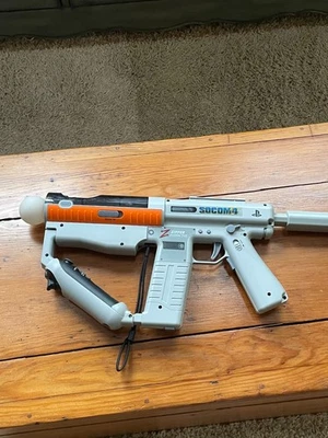 PISTOLA INTERACTIVA PLAYSTATION PS3 PS4 SOCOM 4 CREMALLERA CON CONTROLADOR DE MOVIMIENTO FUNCIONA Foto 1 de 4