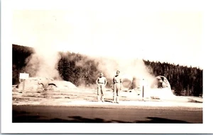 RPPC Real Photo Postcard Yellowstone 1930s Grotto Geyser Young Men in Front WY - Picture 1 of 2
