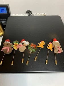 Weihnachtsmützennadeln goldfarben 7 Stück - Bild 1 von 3