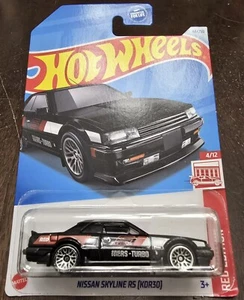 Hot Wheels 2024 Nissan Skyline RS (KDR30) Black Target Red Edition #4/12 *NEU* - Bild 1 von 2