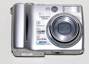 Nikon COOLPIX 5200 5.1MP Digital Camera, Battery Door not closing, NO BATTERY - Picture 1 of 11