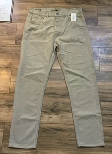 Jeans uomo GUESS Eco Relaxed James vita alta logo beige 31 - Foto 1 di 10